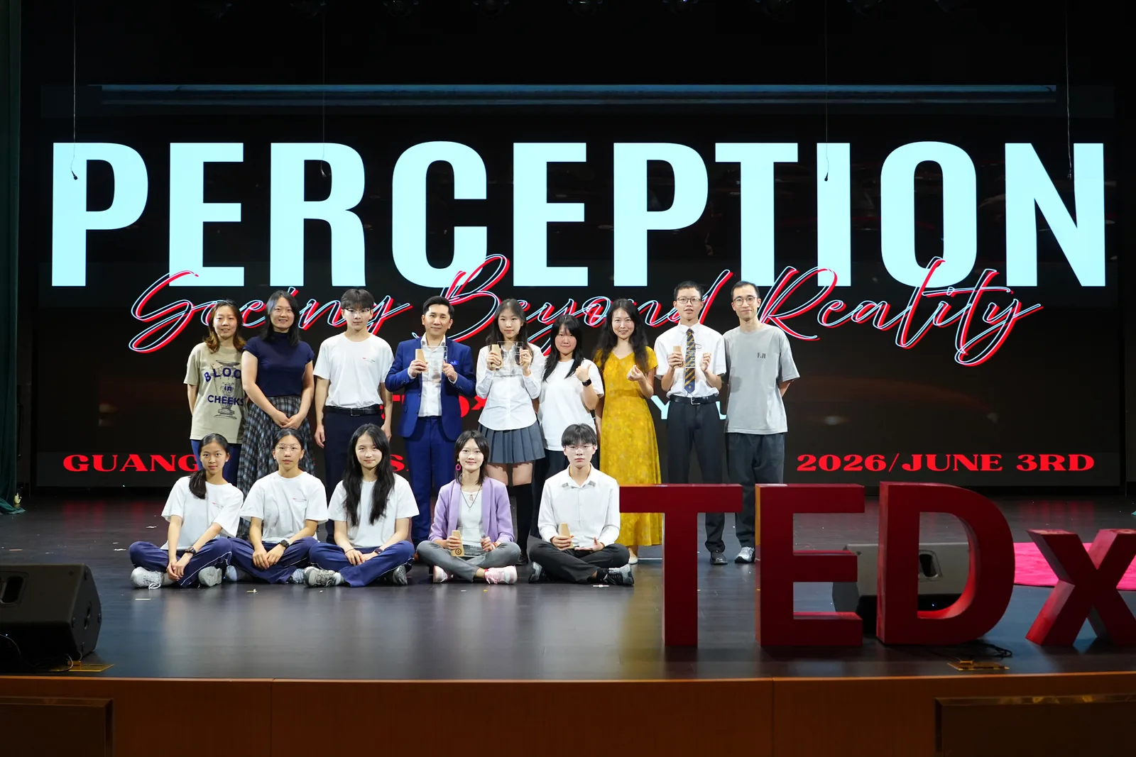 The TEDxGCGS Youth speakers gathered on stage.